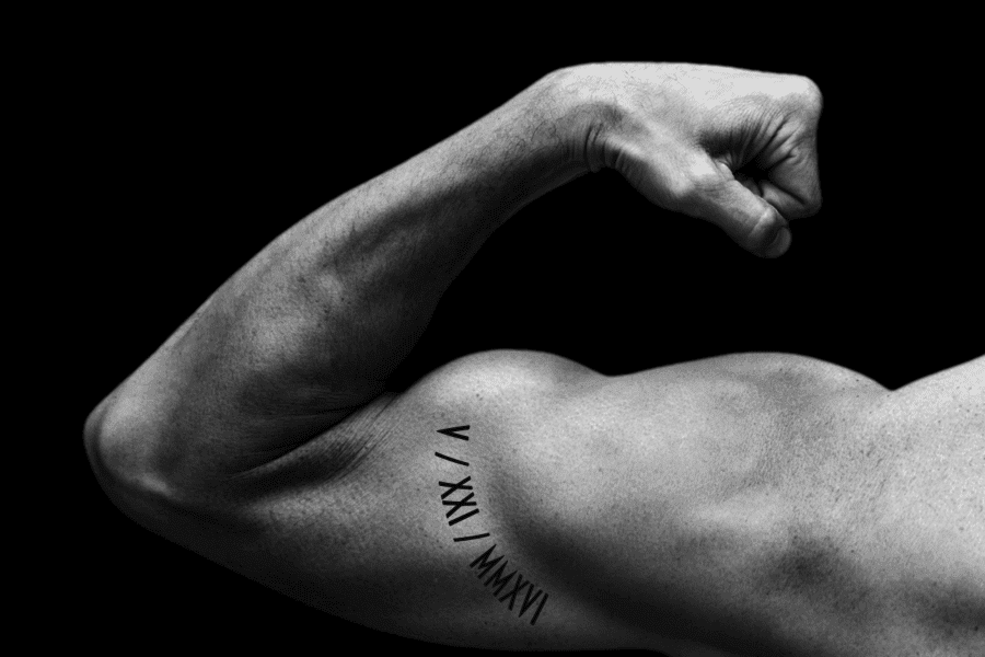 Numeric tattoo on Biceps