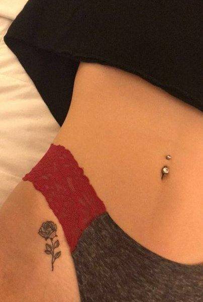 Rose Tattoo on girl Thigh