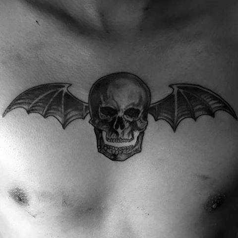 Skull tattoo on chest
